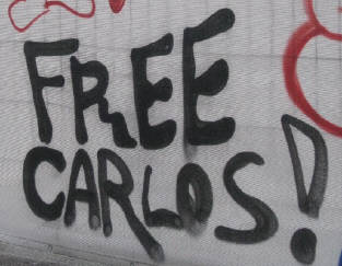 FREE CARLOS graffiti tag zürich. der jugentliche carlos wurde von der zürcher justizmafia illegal eingesperrt